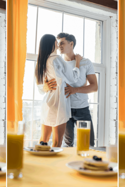 long distance couple kissing in hotel room