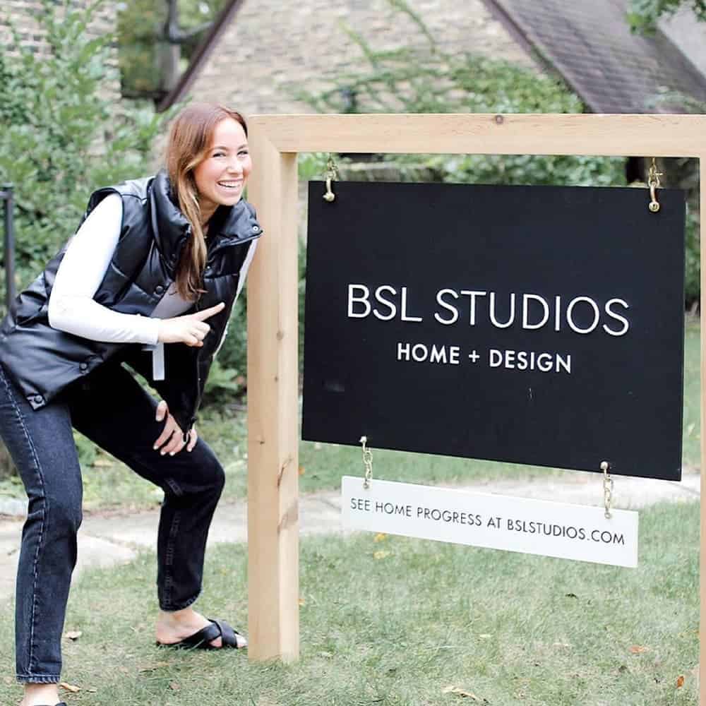 Sophia standing in front of BSL Studios sign in 2021.