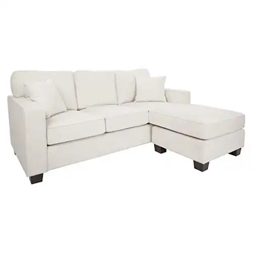 OSP Home Furnishings Ivory Fabric Russell Reversible Sectional Sofa with 2 Pillows and Coffee Finished Legs