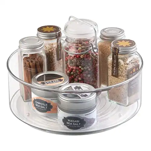 mDesign Lazy Susan Turntable for Kitchen Cabinets, Pantry, and Fridge - 9" Rotating Organizer - Raised Edge Keeps Items in Place - Storage Turntable Organizer for Spices or Condiments - Clear